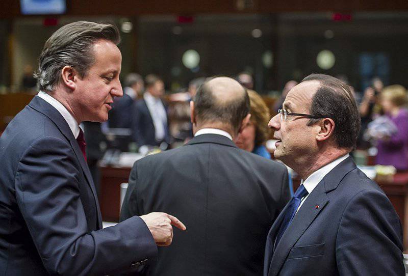Премьер Великобритании Дэвид Кэмерон (слева) и президент Франции Франсуа Олланд возрождают Антанту. Пока —на сирийском направлении. Фото http://www.kommersant.ru/