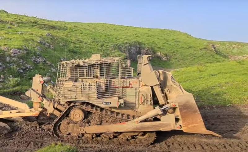 Израильская армия использует бульдозеры Caterpillar D9 для расчистки территорий от мин