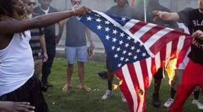 Жители Гаити попросили помощи у России и сожгли флаг США
