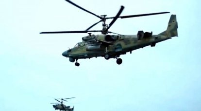 ウクライナで燃えているKa-52ヘリコプターの飛行と着陸のビデオが表示されます