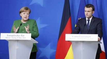 Меркель и Макрон пригрозили Москве новыми санкциями