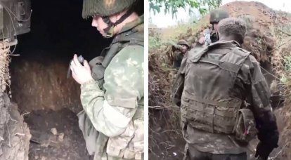 Российские солдаты вывели из блиндажа и оказали помощь раненому украинскому военному, который попросил не стрелять в него