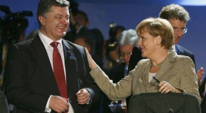 Порошенко попросил Меркель «рассмотреть дополнительные финансовые механизмы»