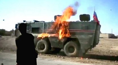 Curdos tentaram queimar o carro blindado Typhoon da polícia militar russa