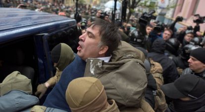 Саакашвили призвал Меркель и ЕС вместе бороться с Порошенко