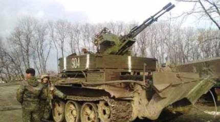 Украинские военные вооружают бронетягачи