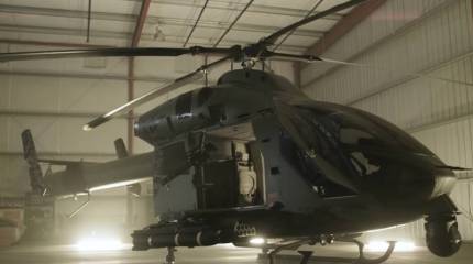 Американский вертолёт MD 969 запускает ракеты из кабины