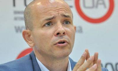 Украинская экономика - в рецессии без перспектив, высока вероятность дефолта в 2015 г: интервью