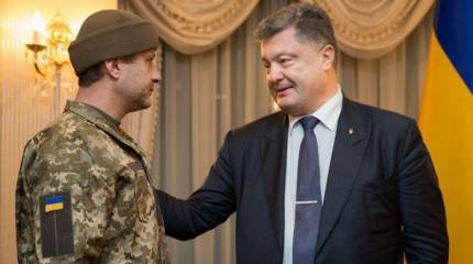 Порошенко помиловал «российского майора» Старкова и поменял его на «киборга» Гречанова
