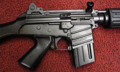 Короткая очередь FN CAL