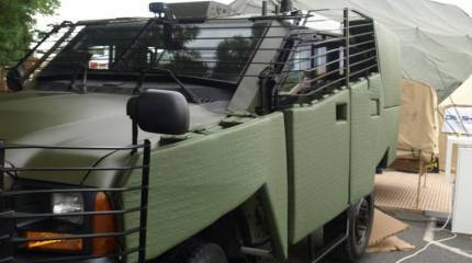 Eurosatory-2012: Plasan представила мягкое покрытие Enhanced FlexFence способное выдержать несколько попаданий РПГ