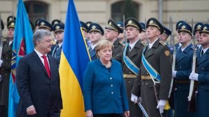 В Киеве Ангелу Меркель обвинили в потере Украиной Крыма и Донбасса