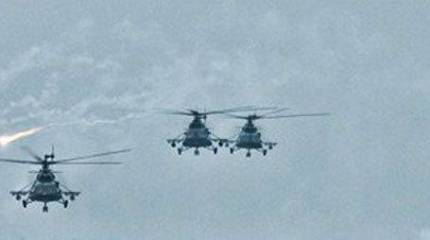 Над Памиром проведены противозенитные маневры Ми-8МТВ и Ми-24П