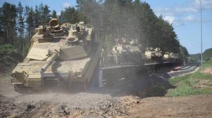 «Первая ветка к Восточному валу»: в Литве танки «Абрамс» доставлены по новой колее к границе Беларуси
