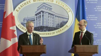 Яценюк: Канада помогает тренировать украинских военных, участвует в создании полиции и предоставляет техническую помощь