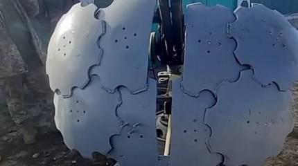 На фронте замечена стойка пулемёта ДШК с защитой из дисков для боронования