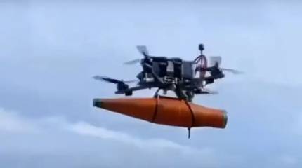 Показаны кадры работы БПЛА ВС РФ по украинским позициям в Георгиевке на Марьинском участке фронта