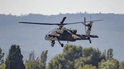 В США запустили ударно-разведывательный дрон Altius-700 с борта вертолёта Apache