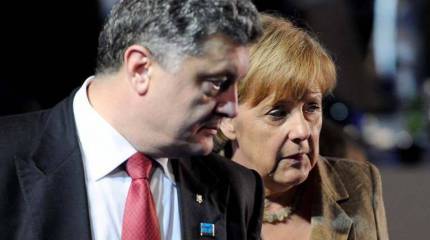 Главы Украины и ФРГ осудили ополченцев за постоянные нарушения перемирия