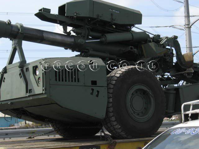 Autonomous towed howitzer ATHOS 2052