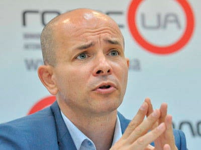 Ukrainian economy - in a recession without prospects, probability of default in 2015 is high: interview