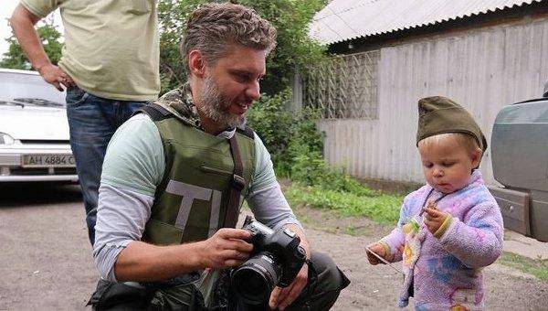 Russian journalist in Ukrainian captivity. # Free Andrew