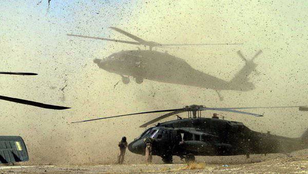 Gli elicotteri d'attacco Apache statunitensi hanno battuto l'attacco dello Stato Islamico all'aeroporto di Baghdad