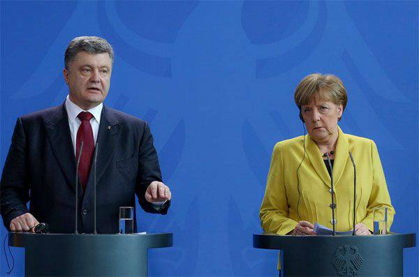 Poroschenko sprach in Berlin mit Merkel, nachdem er von deutschen Antifaschisten ausgebuht und als Mörder bezeichnet worden war