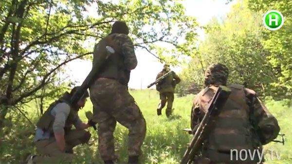 Украинский телеканал выдал в эфир материал, в котором показано, как украинские силовики нарушают Минские договорённости (режим прекращения огня)