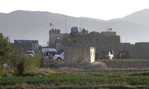 Taliban militants storm an Afghan prison and release up to 400 prisoners