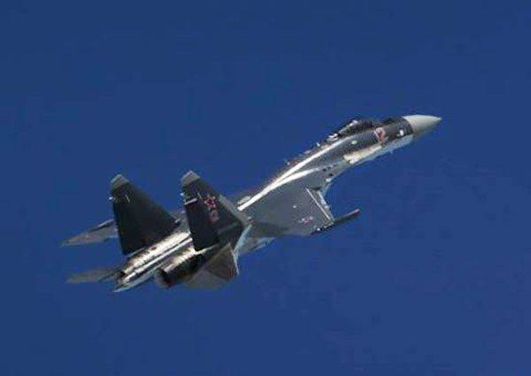 Su-35S within the framework of the flight tactical exercises covered aircraft of the anti-submarine aviation of the Pacific Fleet in the area of ​​the Kuril Islands