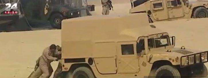 Американский офицер попытался объяснить застрявшие в португальском песке американские броневики частью плана учений Trident Juncture-2015