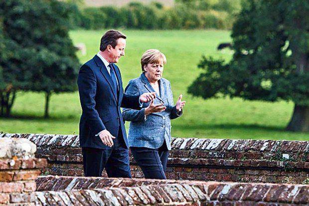 What "secrets" about Russia and ISIS did Merkel and the British intelligence services share with each other?