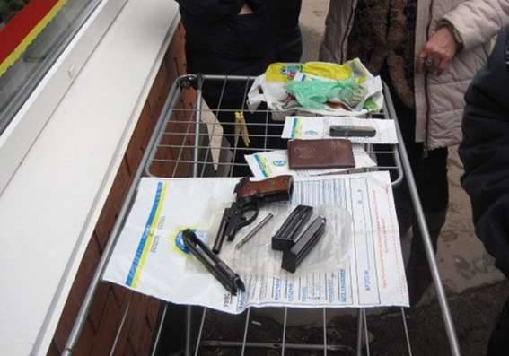 In the market of Krivoy Rog from a tray sell firearms and ammunition