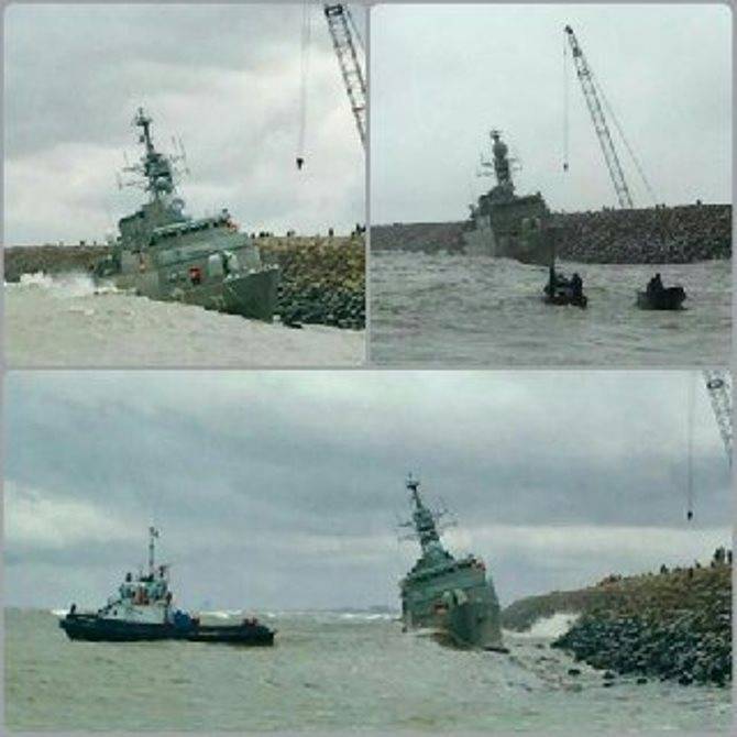 Iranian frigate thrown on a breakwater during a storm