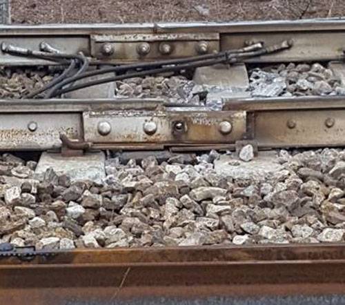 At the site of a train wreck in Italy, a strange violation of the rail track integrity was found.