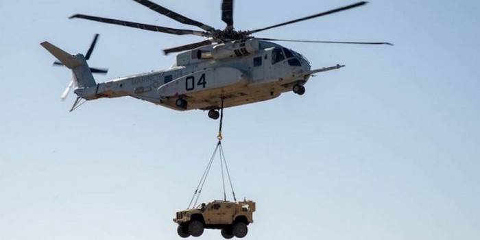 The newest American helicopter for the first time raised the armored vehicle