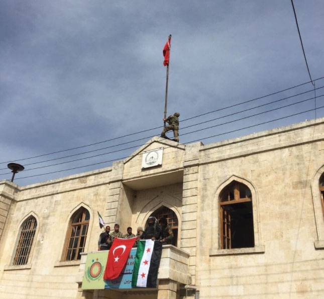 Above Afrin raised the Turkish flag