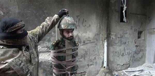 Sophisticated penalty igilovtsami captive officer CAA in Yarmuk. Syrian army revenge