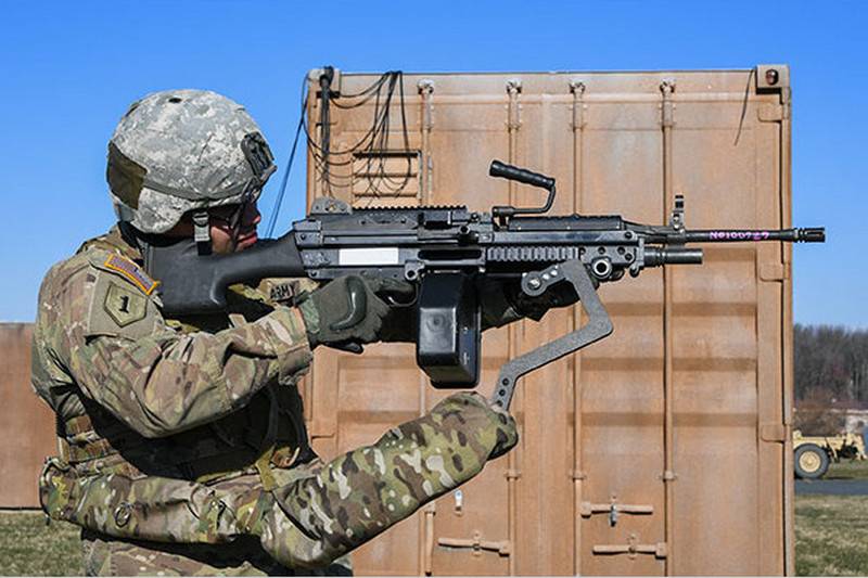 Third hand In the US, testing a device to ease the weight of the weapon