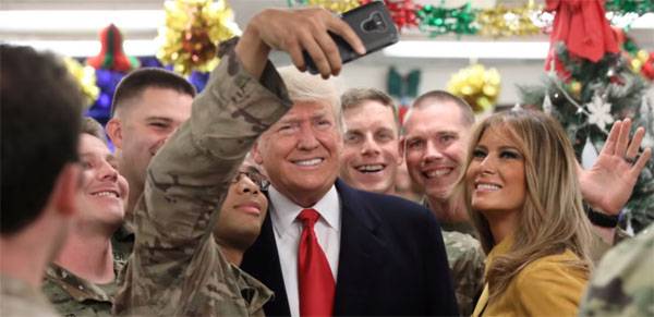 Trump visits US base in Iraq