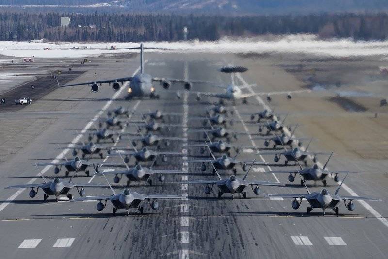 American F-22 fighter jets work off Elephant Walk in Alaska