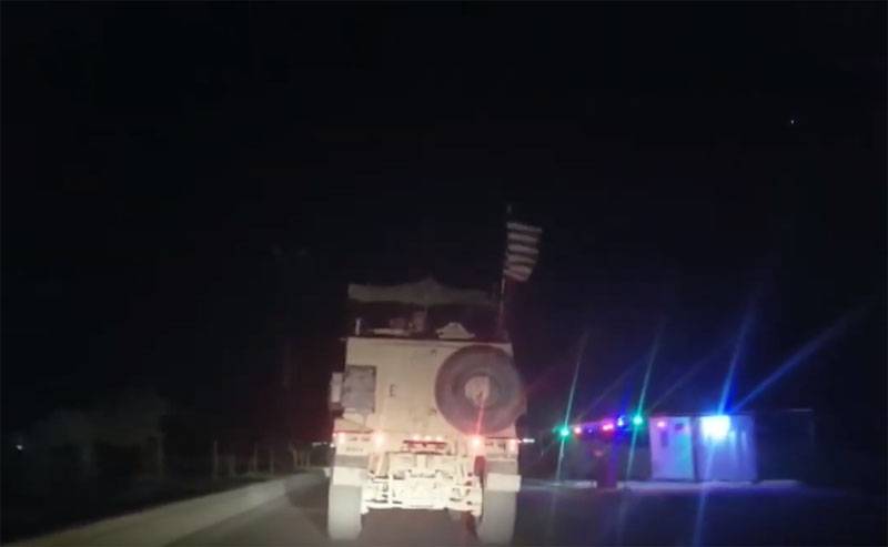 a Convoy of the US army under the cover of helicopters moving in the province of Deir ez-Zor from Iraq