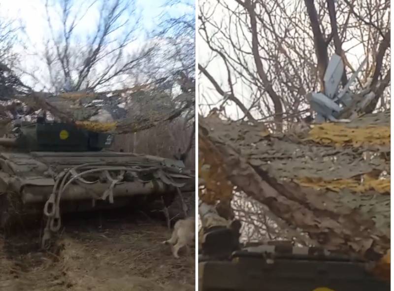 Появились кадры двух российских БПЛА «Ланцет», якобы застрявших в маскировочной сетке над танком ВСУ