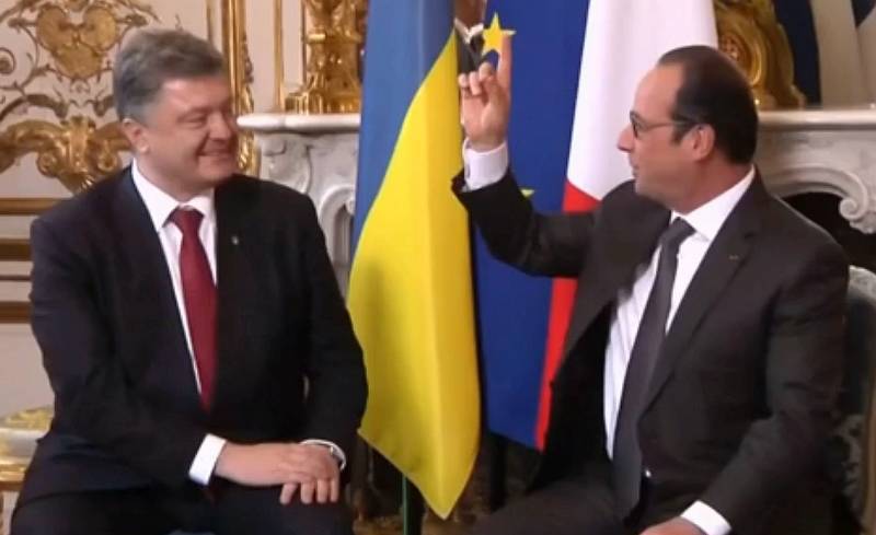 "Minsk anlaşmaları Putin'i kandırmak içindir": Hollande, Poroşenko'nun temas halinde olduğuna inanarak Rus şakacılarla konuştu
