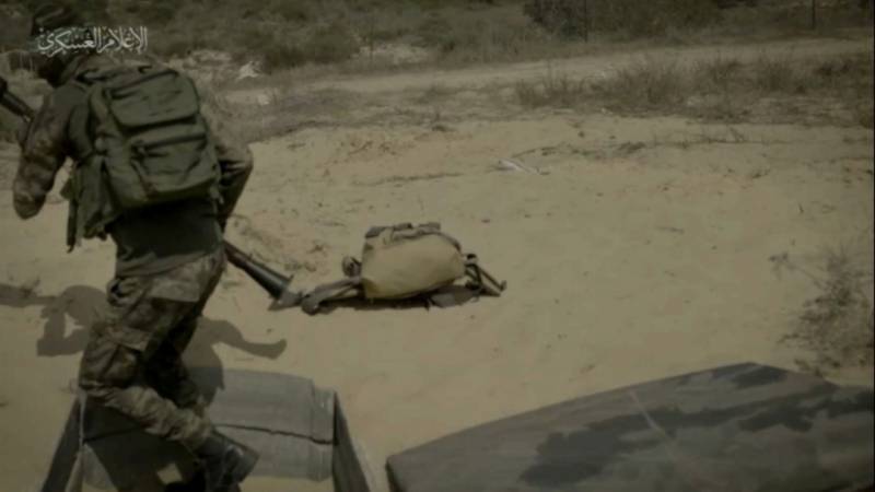A still from a video showing Hamas fighters training to organize an ambush from a tunnel on an enemy tank unit