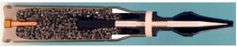 Sectional view of a cartridge with an M919 projectile. Chuck length: 223 mm. Projectile length including fins and plastic nose cap: 144.3 mm. Cartridge weight: 454 grams.